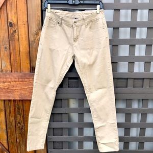 Khaki color skinny jeans with lots of stretch.  Cute pockets in back. Never worn